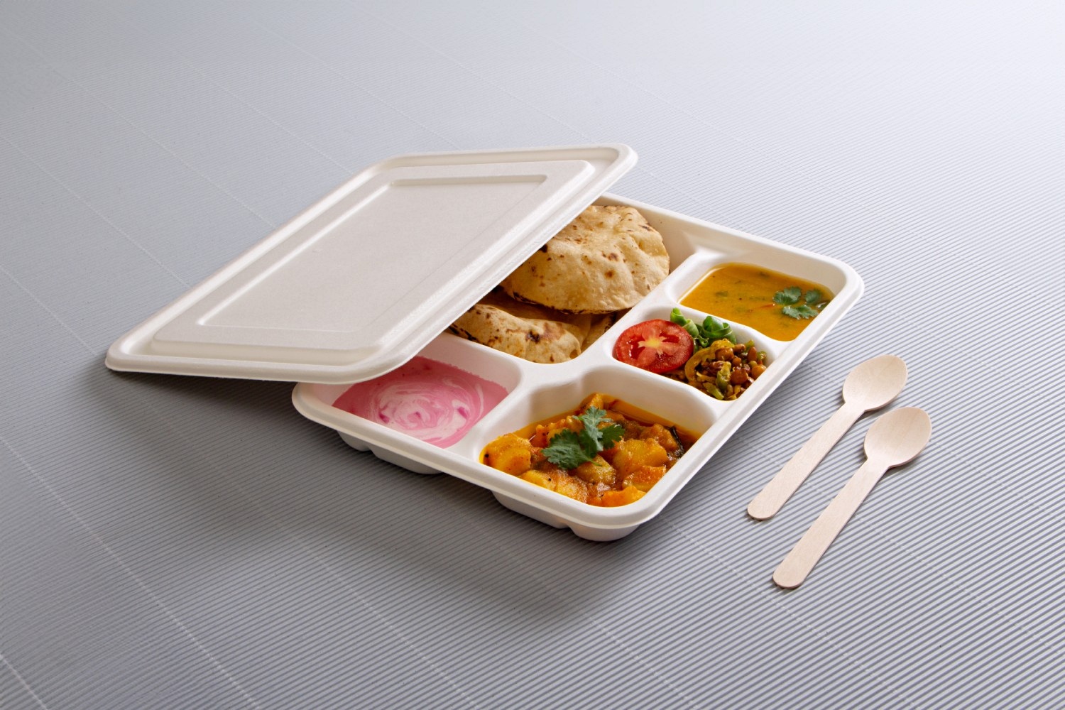 https://www.ecolates.com/wp-content/uploads/2023/02/5-compartments-bagasse-lunch-tray-with-lid.jpg