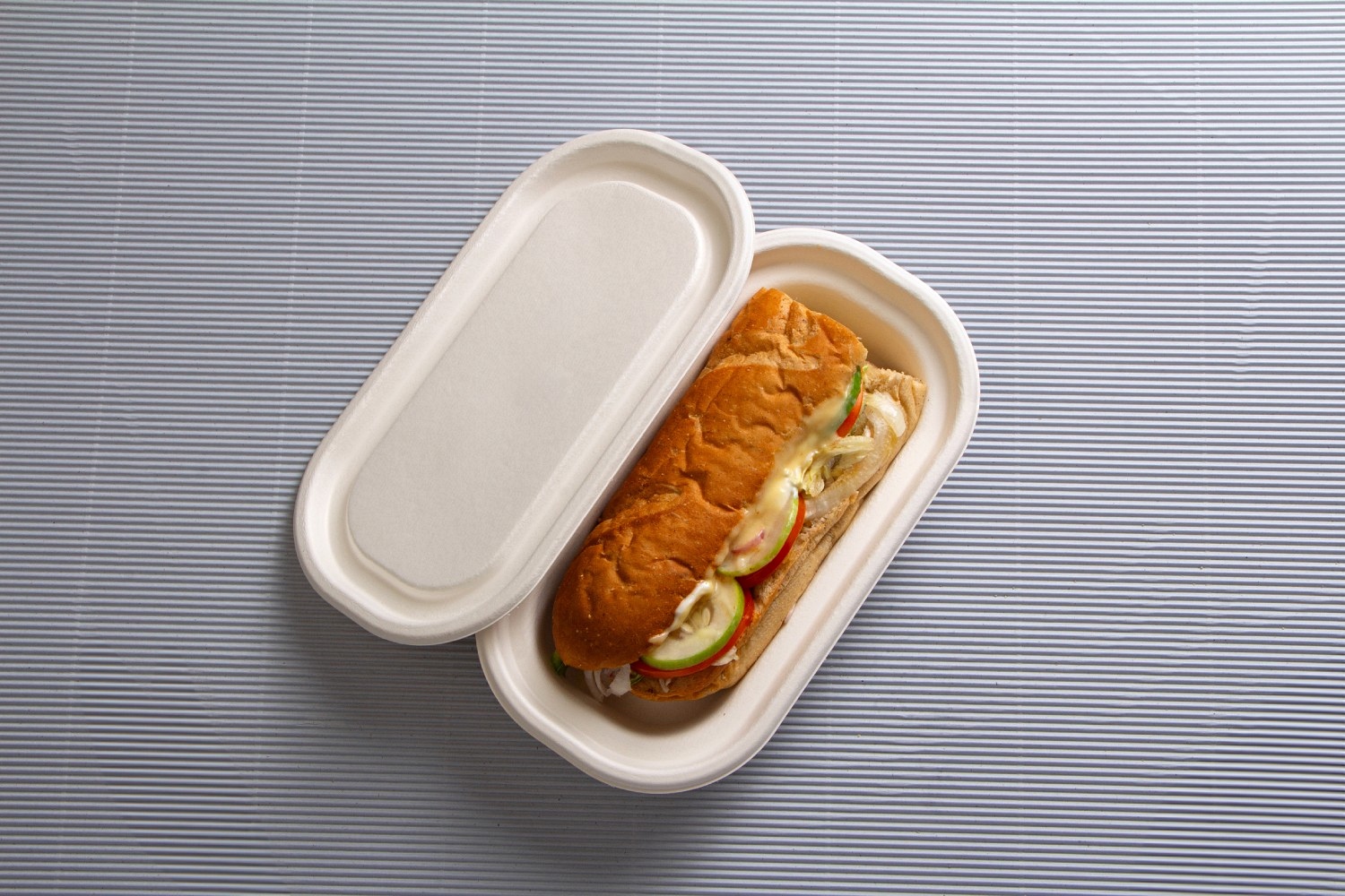 https://www.ecolates.com/wp-content/uploads/2023/02/bagasse-food-container-with-lid.jpg